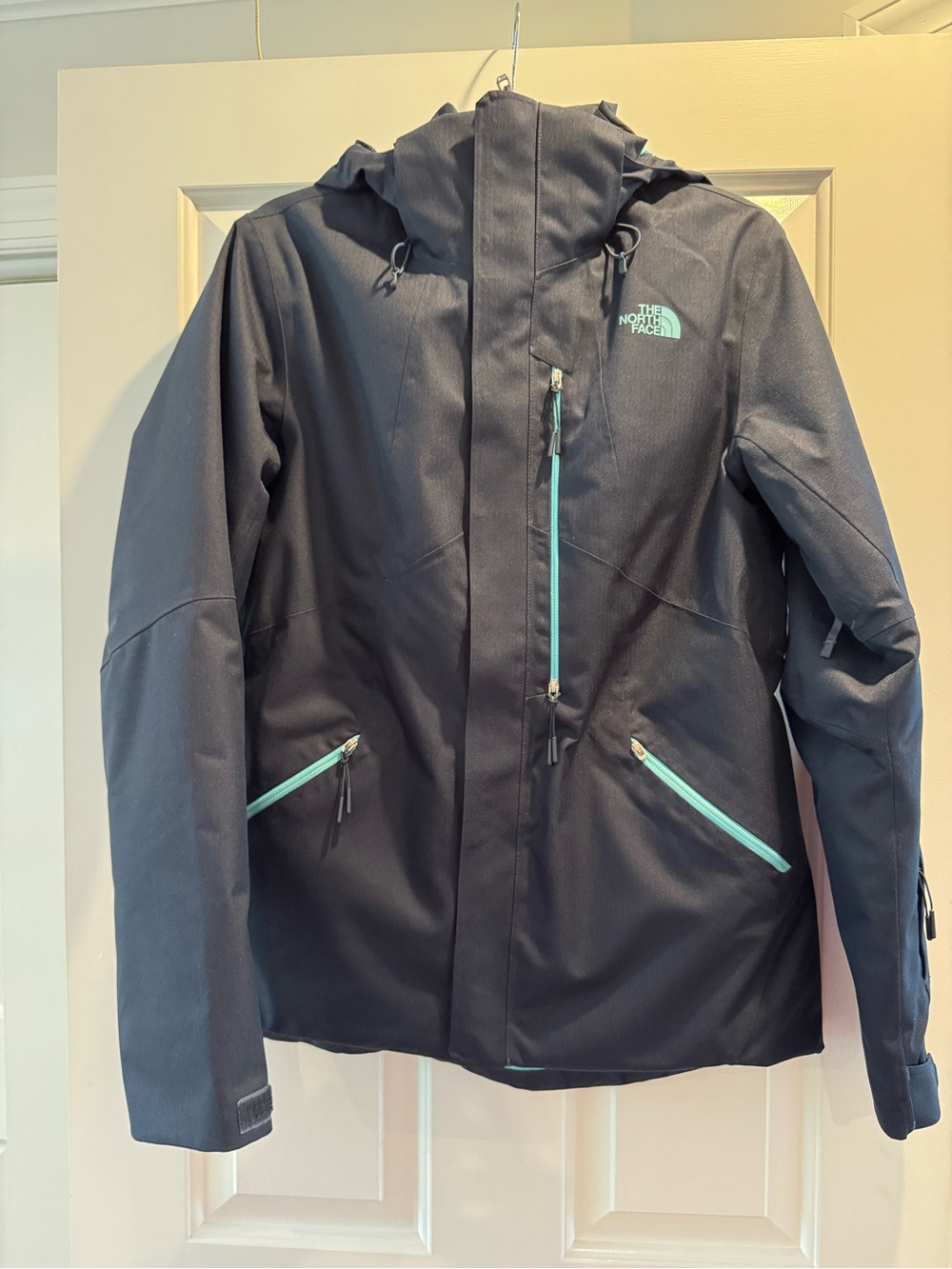 The North Face Black Ski Jacket with Teal Zippers